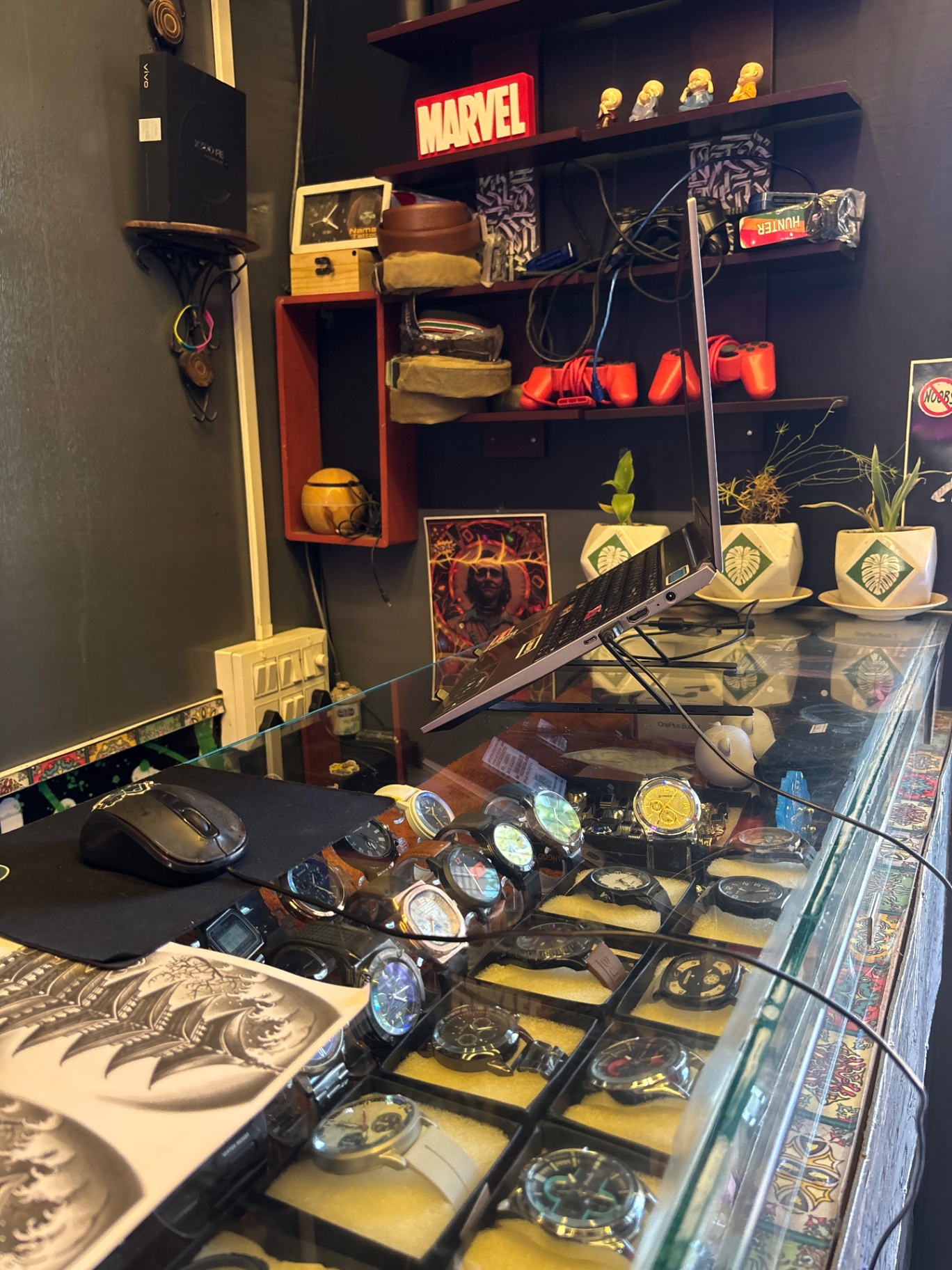 SKY HANGERS store — counter with watch display