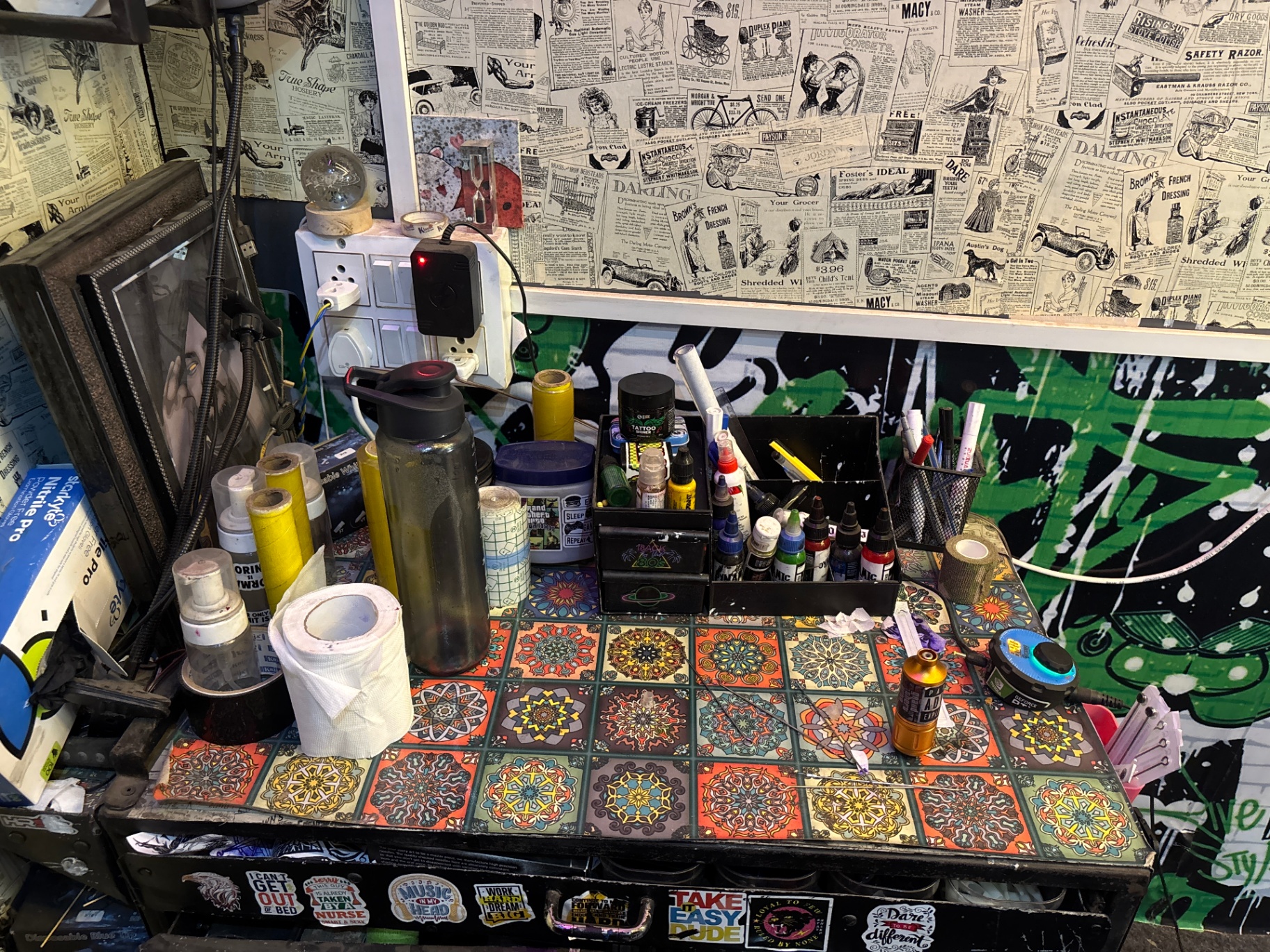 Sky Hangers tattoo studio — workstation with inks